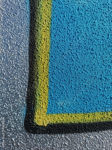 Beautiful street art graffiti. Abstract creative drawing fashion colors on the walls of the city. Urban Contemporary Culture. Art underground. The wall is decorated with abstract drawings house paint