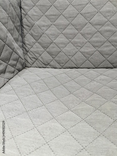 grey quilted corner background selective focus
