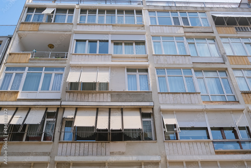 facade of a building windows and balcony. urban background facade of a building windows and balcony. urban background