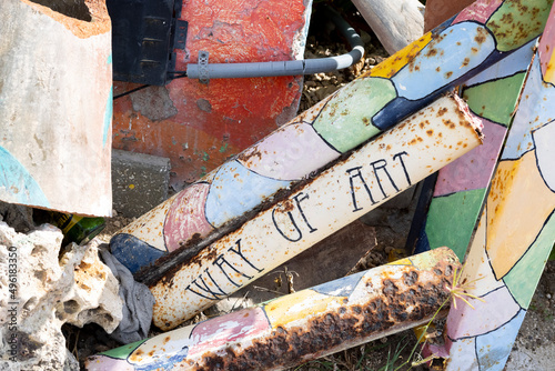 Rusty pipes with the text "WAY OF ART" in Willemstad, Curacao