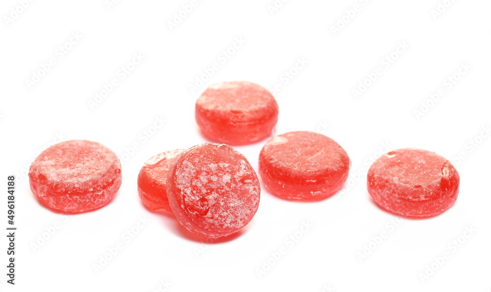 Sour cherry candy pile isolated on white 