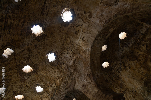 Photo interior of old Turkish baths of Ronda in Malaga, Spain