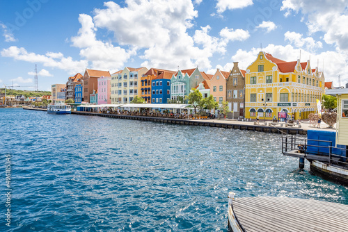 Famous colorful waterfront buildings in dutch-caribbean, colonial style viewed from the Queen-Emma-Bridge in Willemstad, Curacao