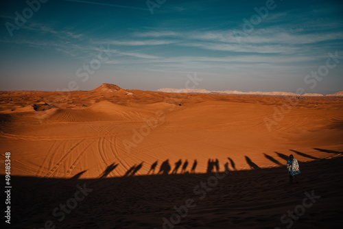 Sundown in desert. Red sand desert background.