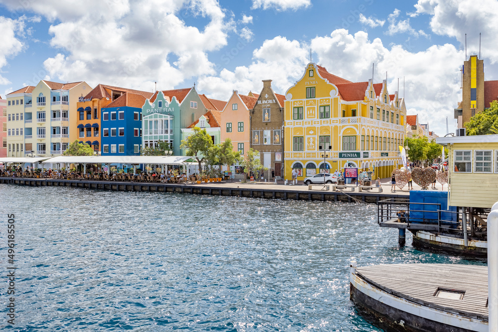Famous colorful waterfront buildings in dutch-caribbean, colonial style viewed from the Queen-Emma-Bridge in Willemstad, Curacao