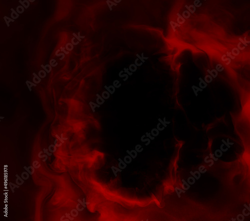 Abstract background of chaotically mixing puffs of smoke on a dark background