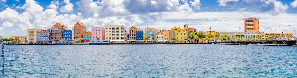 Famous colorful waterfront buildings in dutch-caribbean, colonial style viewed from the district Otrobanda in Willemstad, Curacao