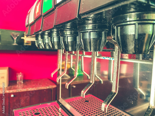 selective focus at heart valve shape of juice dispenser on the table. / concept of refreshment and healthy