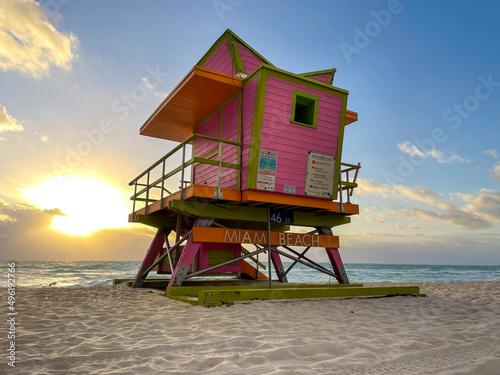 Iconic orange and pink lifeguard house in Miami Beach. Beautiful sky at sunrise © Pedro