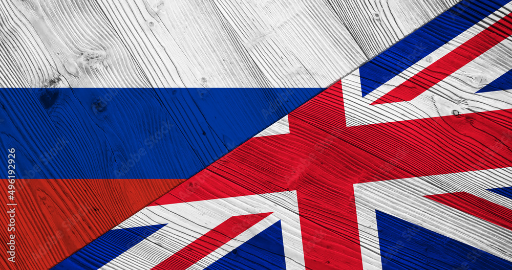Fototapeta premium Background with flag of Russia and England on divided wooden board. 3d illustration