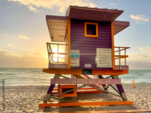 Iconic purple lifeguard house in Miami Beach. Beautiful sky at sunrise © Pedro