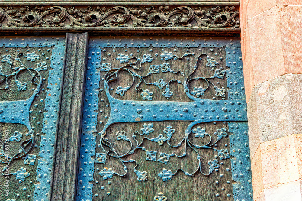 Traditional metal decoration on entrance door.