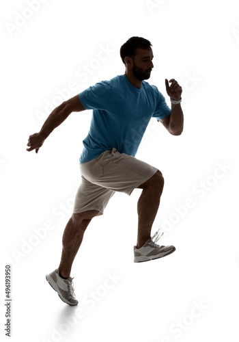 Silhouette of sporty male r...