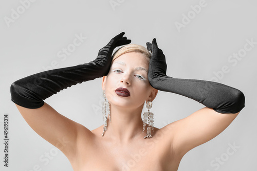 Beautiful young woman with ...