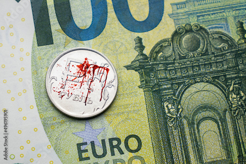 bloody Russian ruble against the background of the euro, the war in Ukraine, the exchange rate of the ruble, the fall of the ruble photo