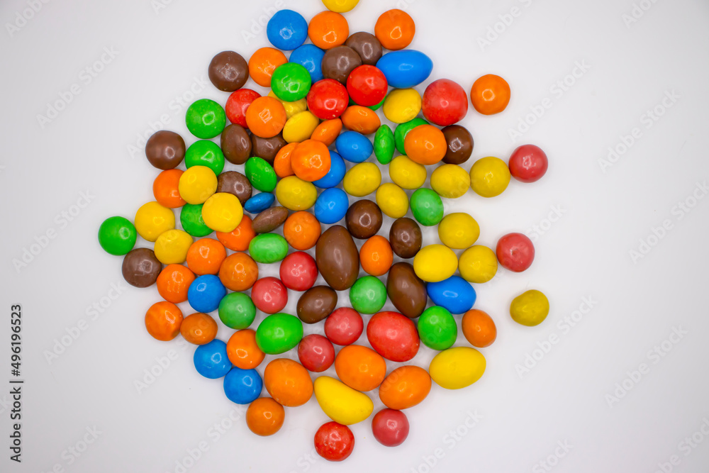 colored candies on a white background