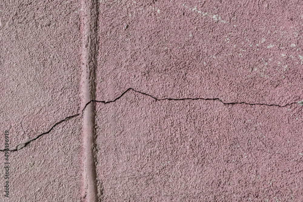 Obraz premium Crack split old wall facade building broken surface texture cracked background