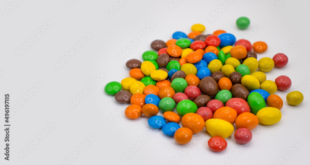 colored candies on a white background colored candies on a white background