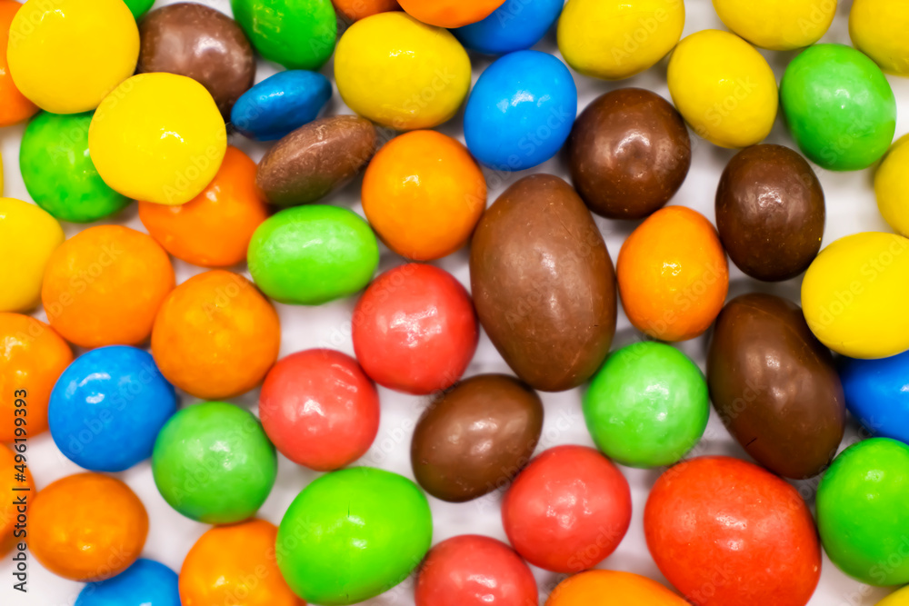 colored candies on a white background colored candies on a white background