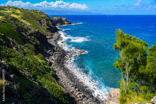 Aerial view of the cliffs of Lipoa Ridge above the Pacific Ocean along the Honoapiilani Highway in West Maui, Hawaii, United States