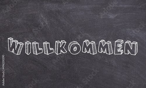 Willkommen sign on chalkboard german welcome