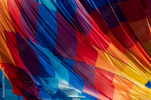 Close up images of a colorful hot air balloon.