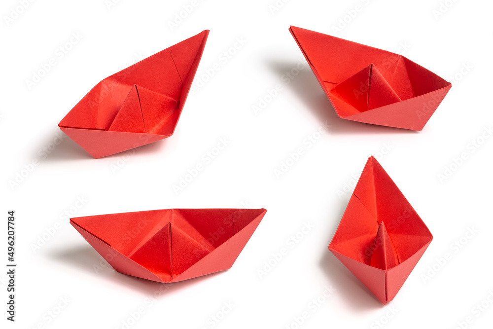 Four Red boats in different directions made from paper isolated on white background
Four Red boats in different directions made from paper isolated on white background