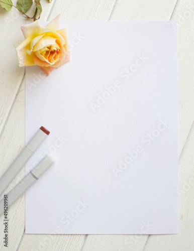Mockup for A4 paper with single rose and drawing material