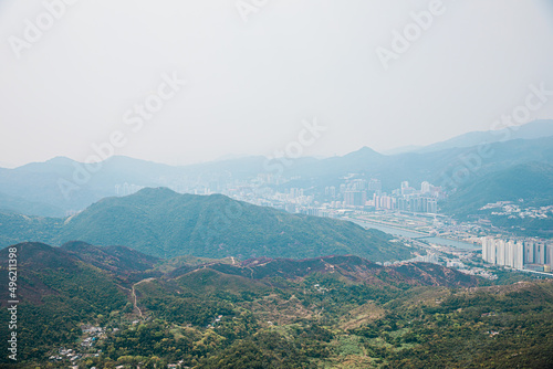 Landscape and cityscape near Sha Tin, residential and commerical center in North of Hong Kong, Misty day