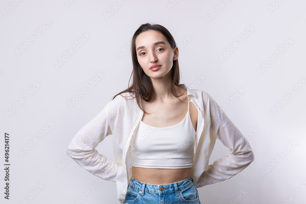 Portrait of a beautiful young woman thinking, isolated on white background Portrait of a beautiful young woman thinking, isolated on white background