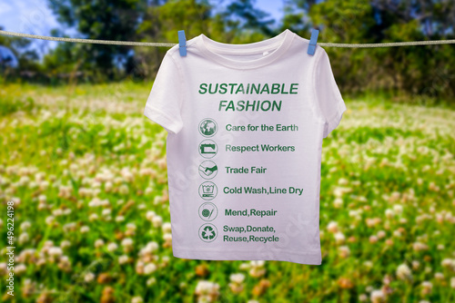 Sustainable Fashion text and icons on shirt on line, sustainable fashion ethical consumerism concept photo