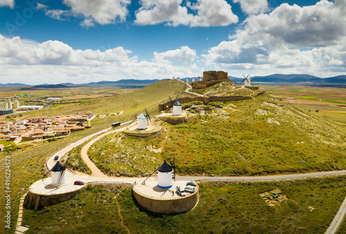 View from drone of famous Route of Don Quixote in Consuegra with windmills , Spain photo
