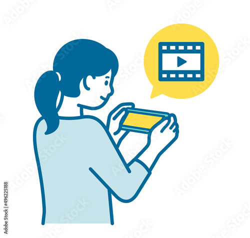 A woman watching a video on her smartphone