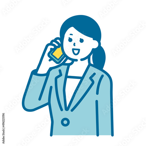 A woman in a suit talking on a smartphone