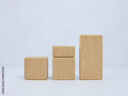 wooden block toy success and Growth concept. suitable for investment and financial content
