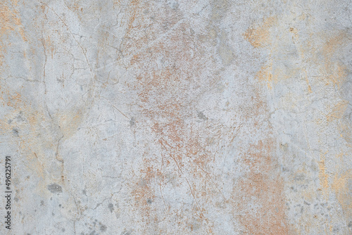 Old cracked and weathered concrete wall background texture © Jane Karelas