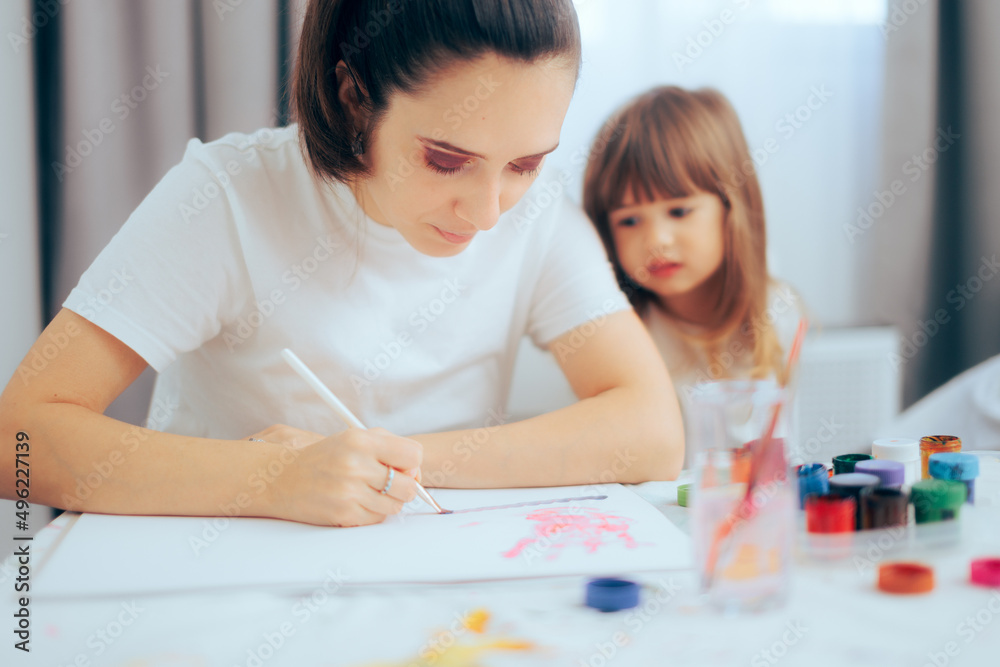 Kindergarten Tutor Teaching Little Girl How to Paint Kindergarten Tutor Teaching Little Girl How to Paint