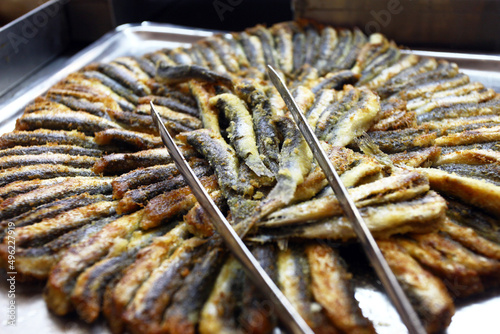 Grilled anchovies (Turkish: Hamsi) on the restaurant table. photo