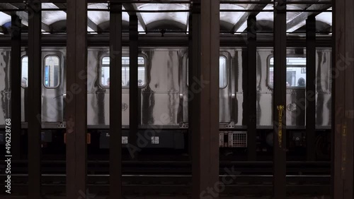 Subway Train departing in Station at 23rd Street in NYC. MTA Mass Transit Authority