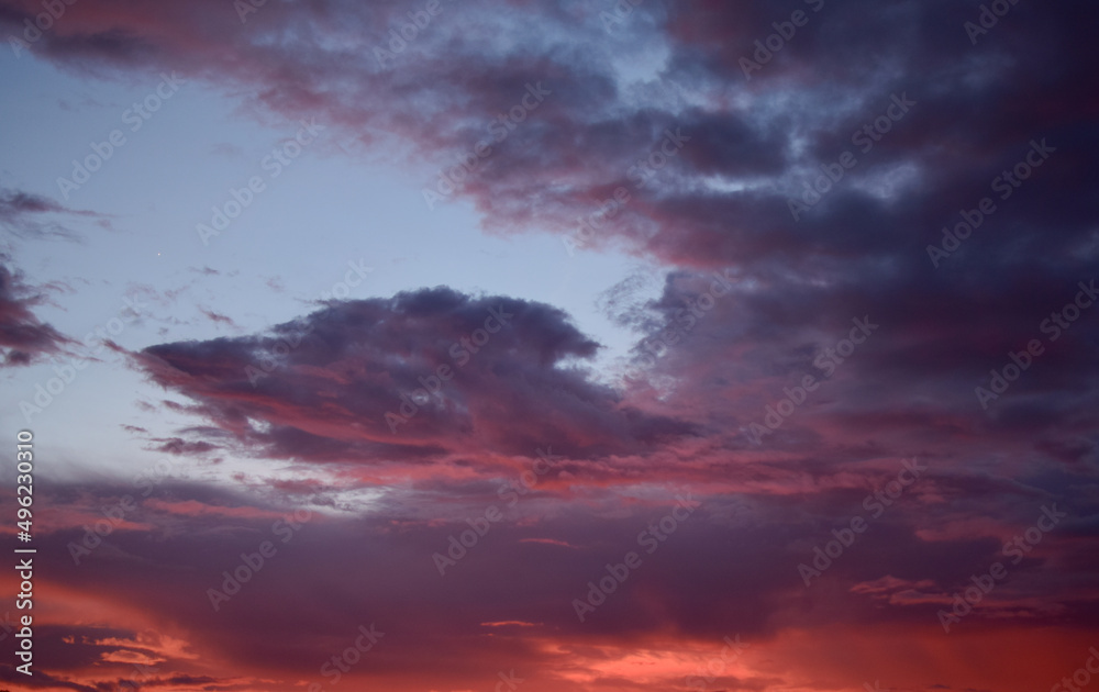 colorful clouds, sky and clouds in shades of purple, red, lilac, aquamarine.