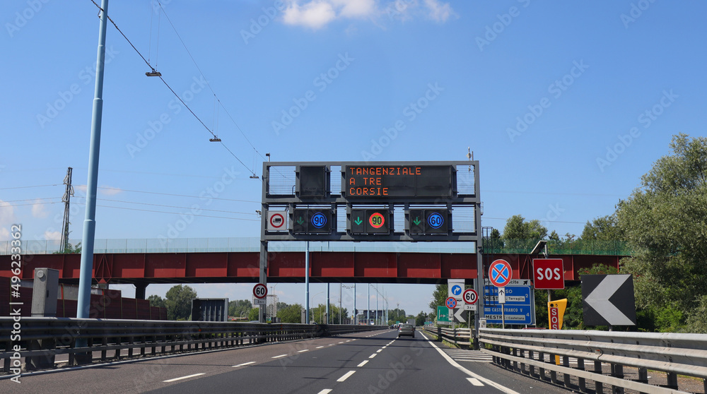 Fototapeta premium road sign of the highway near Venice in Northern Italy and the inscription meaning Ring Road of Mestre at three lanes
