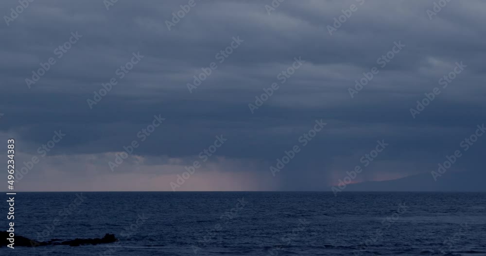 Timelapse of Sunset as Rain Storm Moves Across Island, Maui, Hawaii Timelapse of Sunset as Rain Storm Moves Across Island, Maui, Hawaii