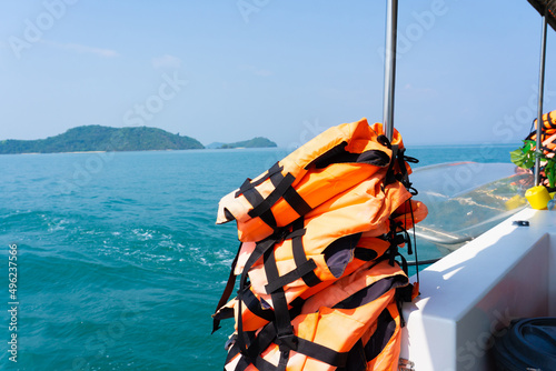 Life jacket sea sailing boat tropical island. Stack life jackets for boat.