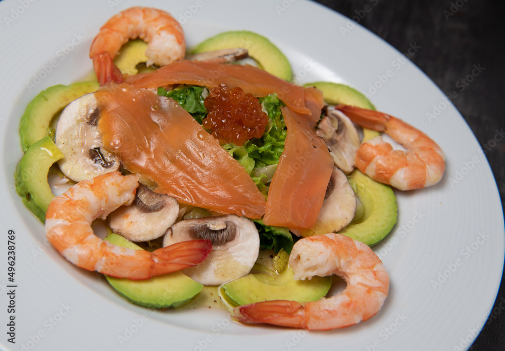 Healthy breakfast with salmon, salad, avocado mushroom, salmon egg, red onion Healthy breakfast with salmon, salad, avocado mushroom, salmon egg, red onion