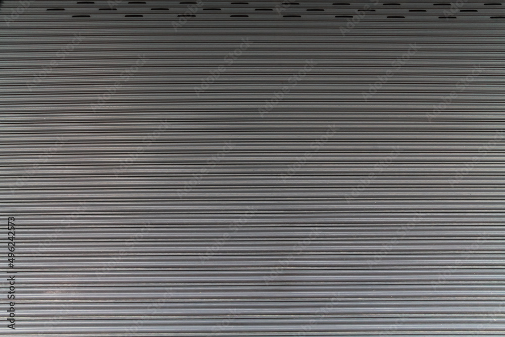 Rolling shutter door background that can be folded or rolled up on top of the door and can also be a blank background suitable for advertising and design projects. Rolling shutter door background that can be folded or rolled up on top of the door and can also be a blank background suitable for advertising and design projects.
