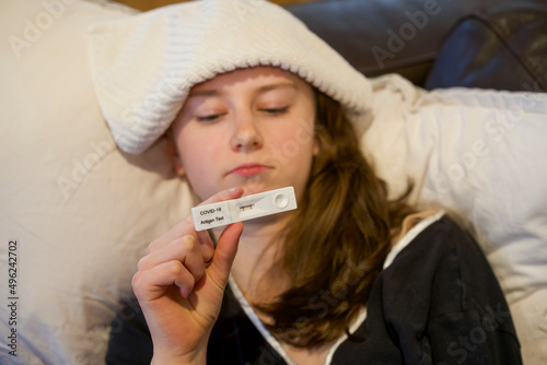 Young person with a Covid rapid test photo