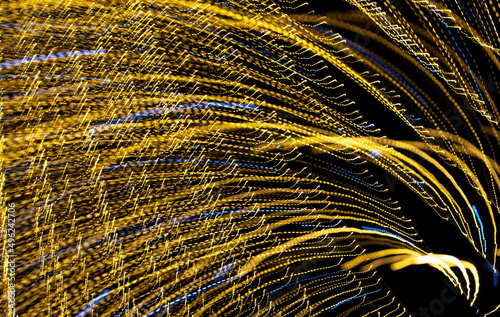 Festive lights in motion as an abstract background.