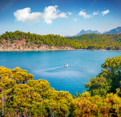 Spectacular seascape of Mediterranean sea. Colorful summer view of small azure bay near Tekirova village vith Mt. Tahtali on background, Turkey, Asia. Beauty of nature concept background. photo