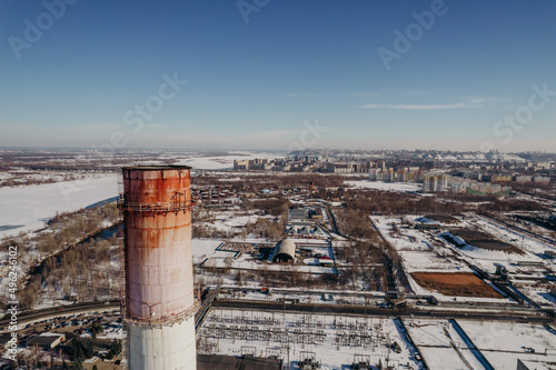 factories and pipes of a big city in winter