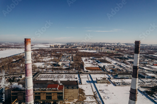 factories and pipes of a big city in winter